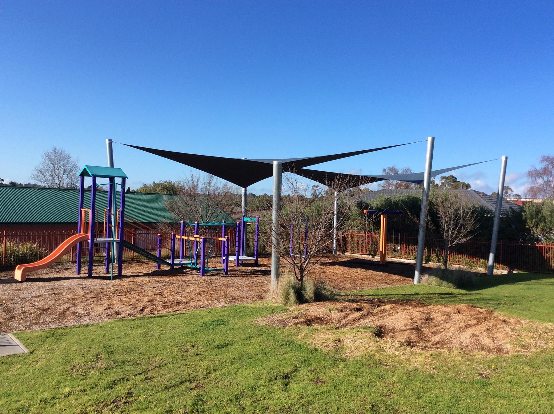 Twin shade sail over play ground