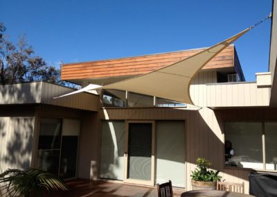 white-shade-sail - shade sail cleaning - how to clean a shade sail - washing shade sails