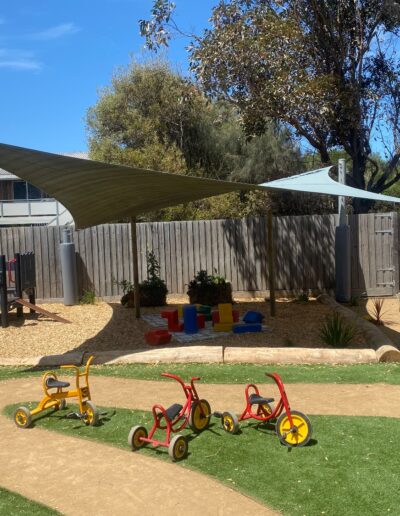 Grey post pad - Green shade sail - Chilcare centre Melbourne - Post padding - square post padding - post protection - safety pad solutions