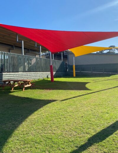 Red shade sail - red pole padding - outdoor learning - school safety padding - Mornington Peninsula School 2.