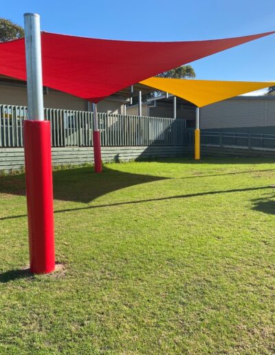 Yellow and Red shade sails - red and yellow pole padding - outdoor learning - school safety padding - Mornington Peninsula School